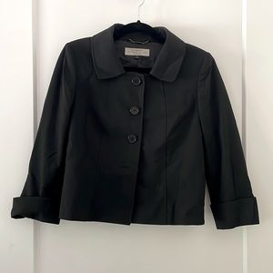 Tahari black cape blazer. Size 4. Blazer sits at hip. Great condition.